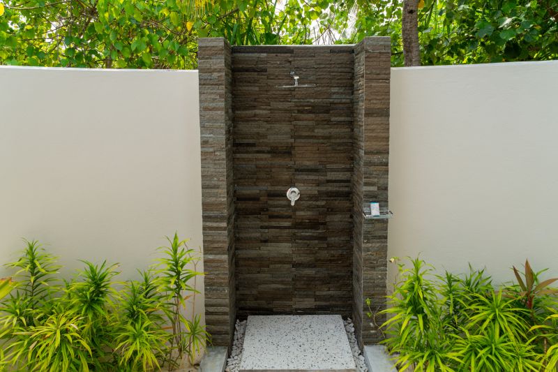 Contemporary Shower with Natural Stone